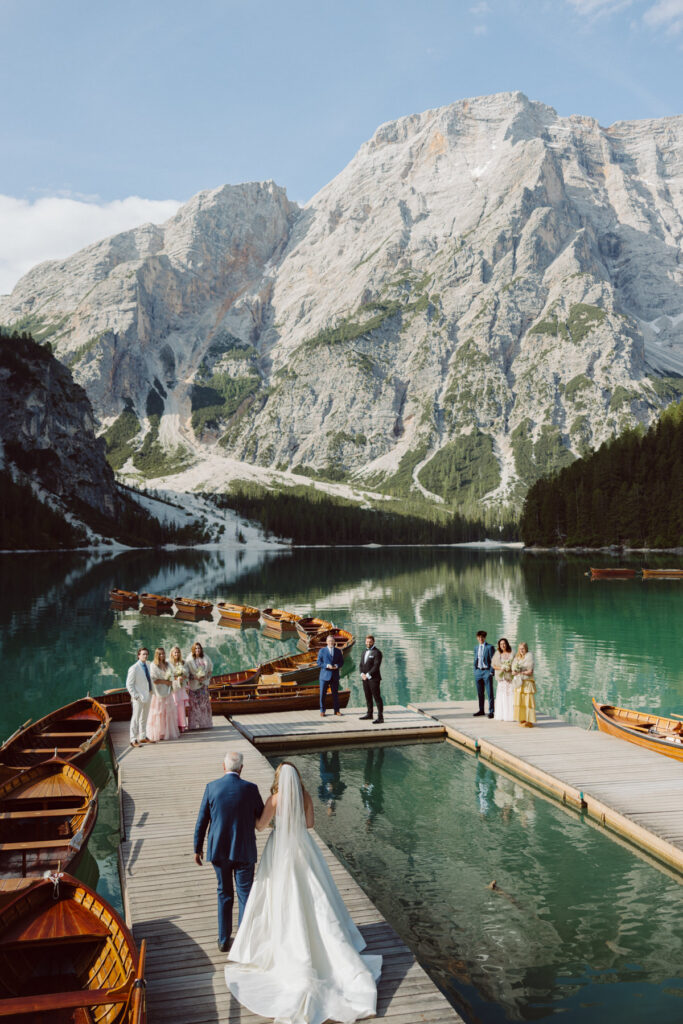 Intimate family ceremony during a destination wedding in the Dolomites, Italy.