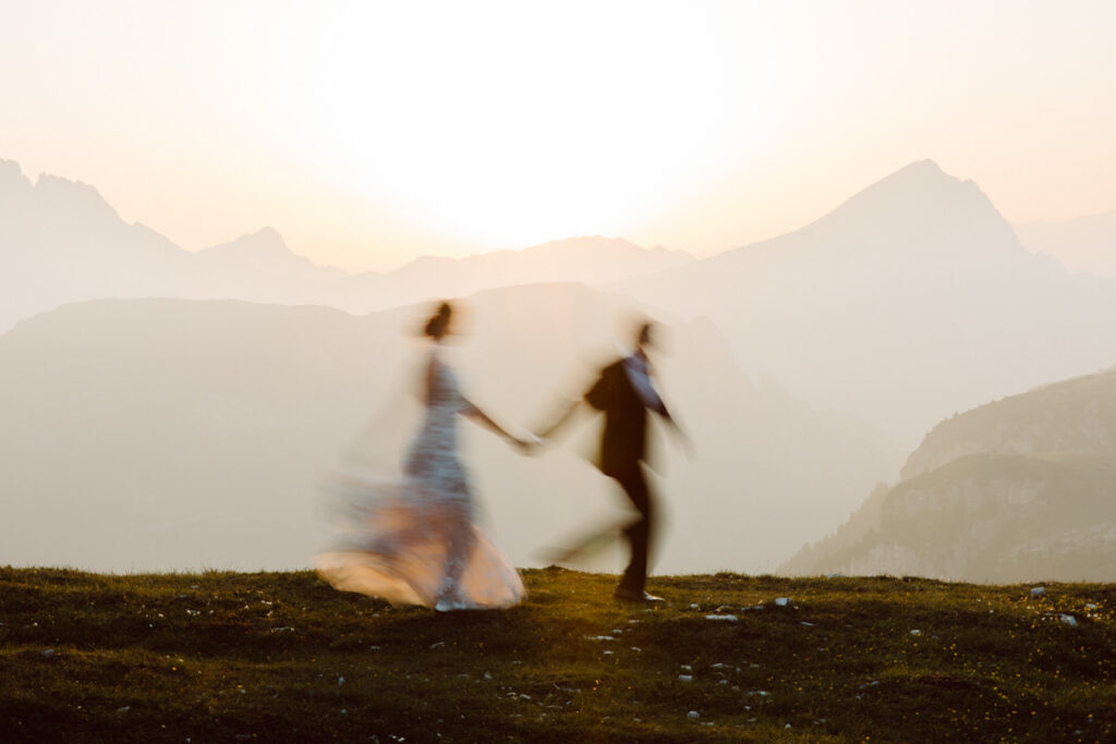 Newlyweds exploring the Dolomites after their adventure wedding in Northern Italy.